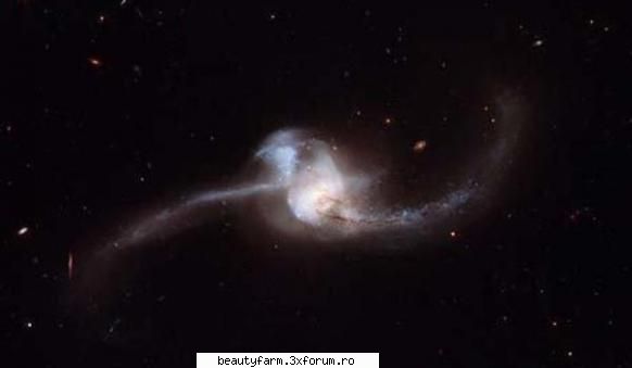 Spectacolul Universului: doua galaxii in coliziune - Imagini inedite ce surprind doua galaxii - WORLD CAFFE